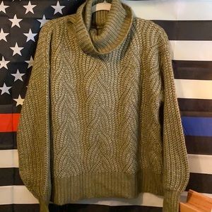 Green turtleneck sweater